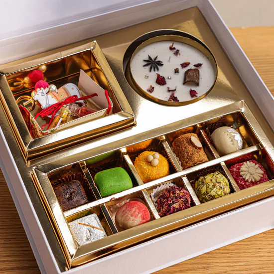 MyGovindas Rakhi Divine Bond Sweets Box | Grace in Scent Perfume and Flowers